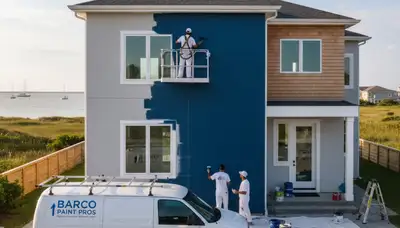 Professional house painters working on residential exterior in Virginia Beach VA